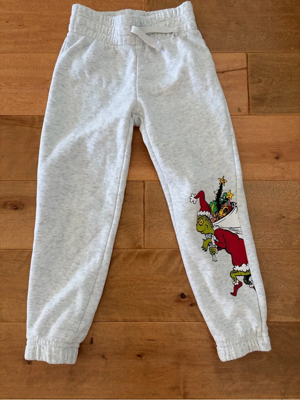 Kids Light Gray Grinch Jogger Sweatpants with Holiday Graphic